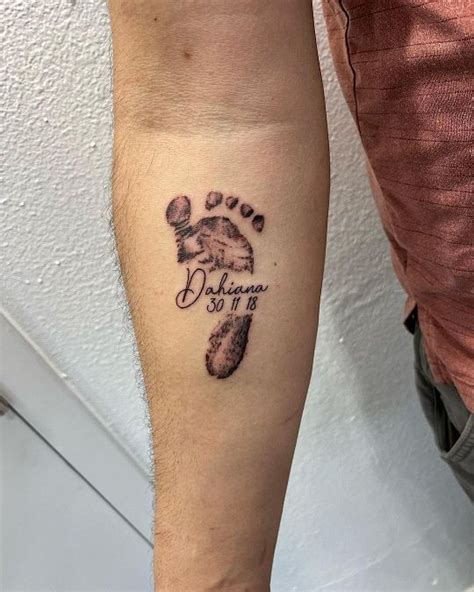 15 Best Footprint Tattoo Designs For Men And Women Baby Hand Tattoo 15 Best Footprint Tattoo Designs For Men And Women Baby Hand Tattoo