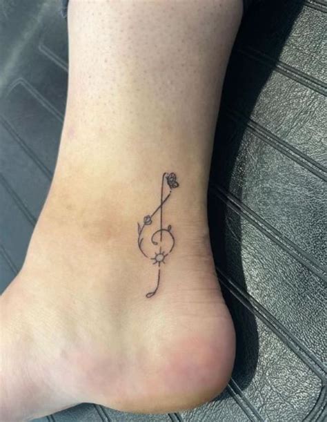 20 Amazing Musical Notes Tattoos Designs With Meanings Ideas And 20 Amazing Musical Notes Tattoos Designs With Meanings Ideas And
