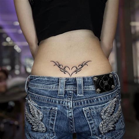 20 Unique Tramp Stamp Tattoo Ideas For Bold Style