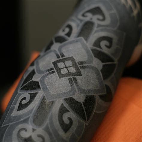 50 Beautiful Blackout Tattoos With White Ink For Perfect Contrast 50 Beautiful Blackout Tattoos With White Ink For Perfect Contrast