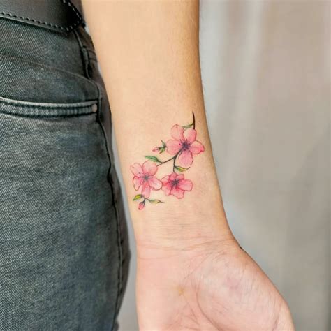 55 Pretty And Meaningful Flower Wrist Tattoo Ideas