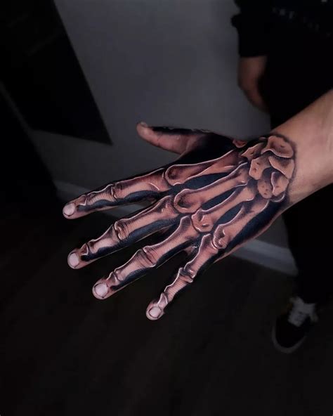 60 Skeleton Hand Tattoo Ideas And The Symbolism Behind Them 60 Skeleton Hand Tattoo Ideas And The Symbolism Behind Them