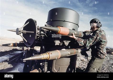 A Member Of The Royal Air Force Regiment Loads A Rapier Missile Into
