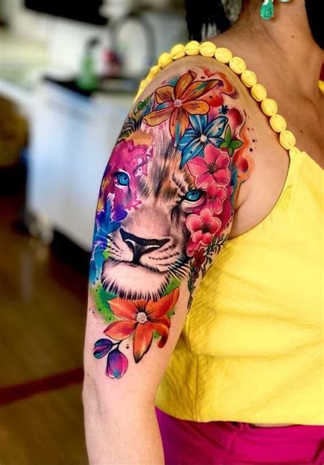 A Woman Amp 39 S Arm With A Colorful Tattoo Design On Her Left Arm And The