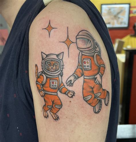 Astronaut And His Partner By Tad Peyton At Jinx Proof Tattoo In