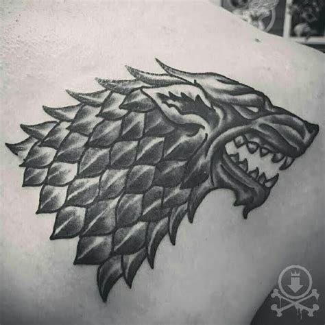 Awesome Black And Grey Dire Wolf Symbol From Game Of Thrones Tattoo By