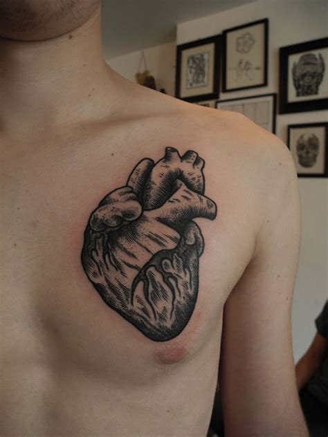 Black Anatomical Heart Tattoo On The Chest Tattoogrid Net Black Anatomical Heart Tattoo On The Chest Tattoogrid Net