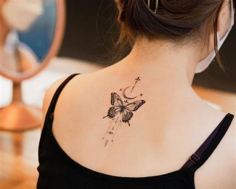 Butterfly Tattoo On Upper Back