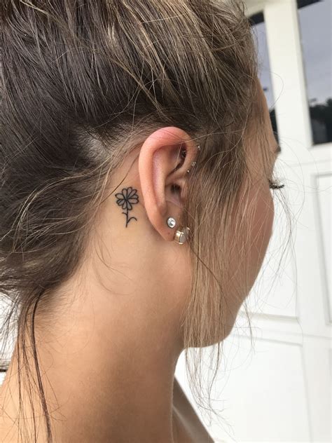 Cute Behind The Ear Tattoo