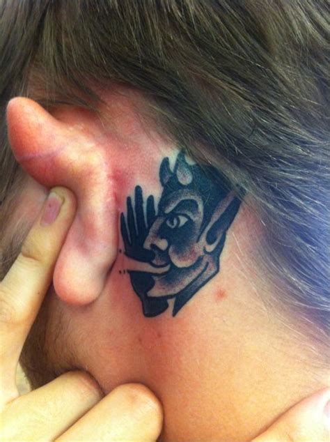 Devil Whispering In Ear Tattoo