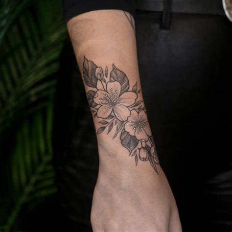 Elegant Flower Wrist Tattoo Ideas For A Delicate Look Elegant Flower Wrist Tattoo Ideas For A Delicate Look