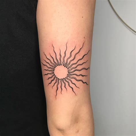 Elegant Sun Tattoo