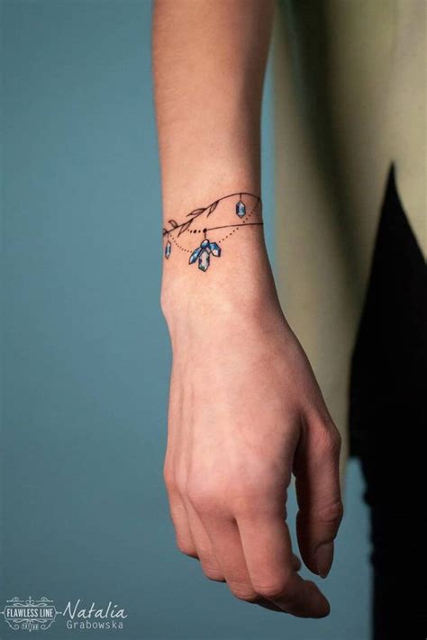 Female Bracelet Tattoo Designs At Gerard Ortega Blog