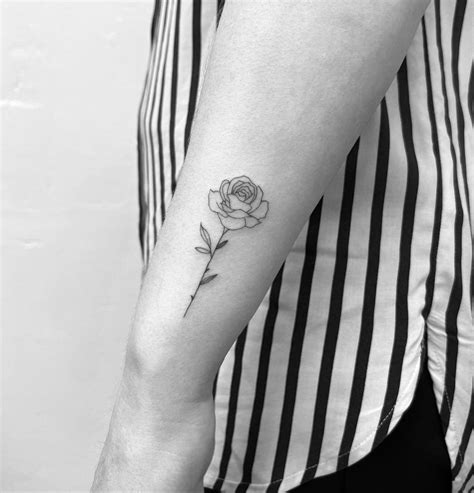 Fine Line Rose Tattoo Located On The Wrist Fine Line Rose Tattoo Located On The Wrist