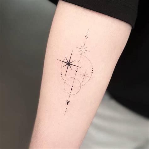 Fine Line Stars Tattoo Located On The Inner Forearm