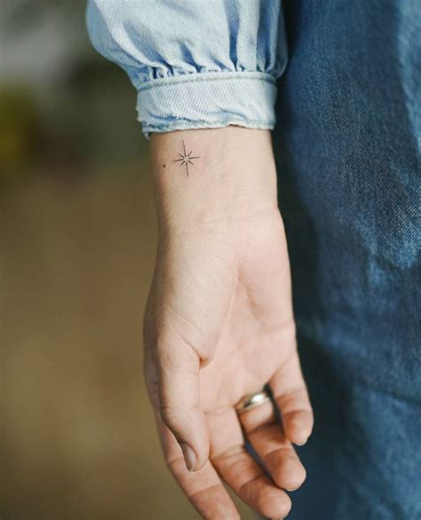 Fine Line Style North Star Tattoo Placed On The Wrist