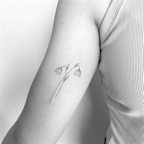Fine Line Style Snowdrop Flower Tattoo Placed On The