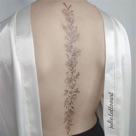 Floral Tattoo Down Spine At Mariam Oberg Blog