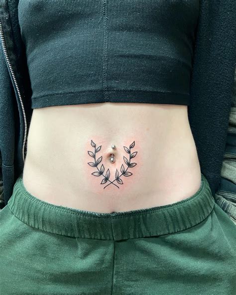 Flower Tattoo On Navel At Ruth Hurley Blog