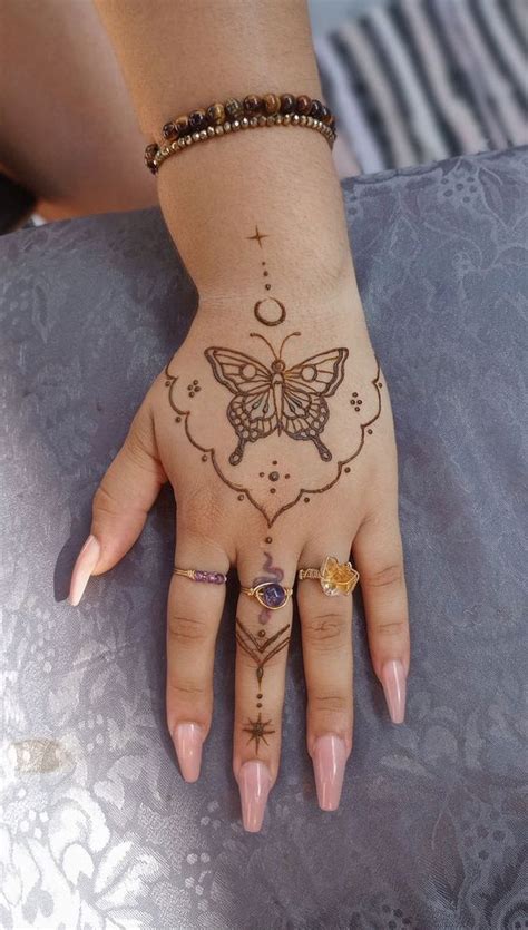 Fluttering Elegance 23 Enchanting Butterfly Henna Designs Flower