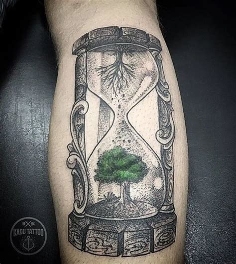 Hourglass Tattoo Design With Tree Elements
