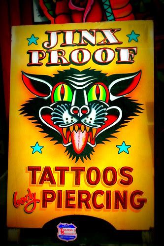 Jinx Proof Sign At A Body Piercing And Tattoo Shop Georget Flickr
