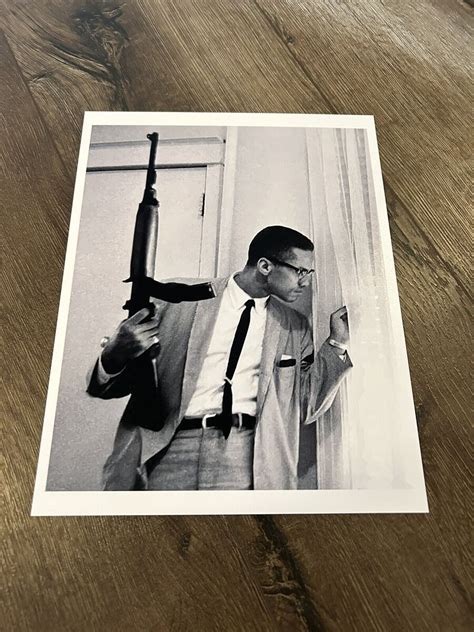 Malcolm X Gun Tattoo