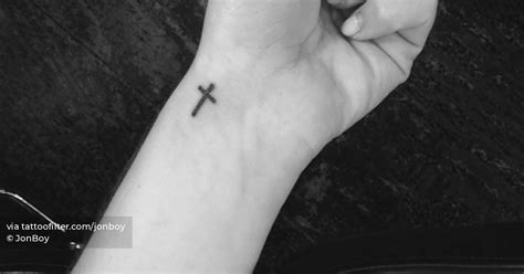 Minimalistic Style Cross Tattoo Placed On The Wrist Minimalistic Style Cross Tattoo Placed On The Wrist