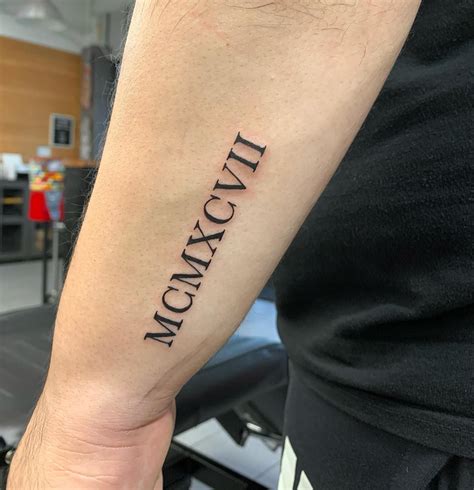 Roman Numerals Tattoo Men 25 Roman Numeral Tattoos For Smart Men Roman Numerals Tattoo Men 25 Roman Numeral Tattoos For Smart Men