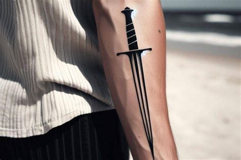 Simple Dagger Tattoo Timeless Elegance In Body Art Your Own Tattoo