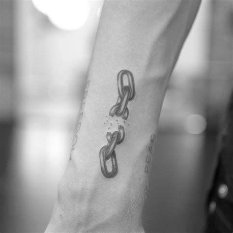 Single Needle Broken Chain Tattoo Located On The Wrist Single Needle Broken Chain Tattoo Located On The Wrist
