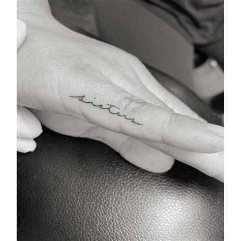 Tattoo Of The Word Amp Quot Sisters Amp Quot Handwritten On The Finger Tattoo Of The Word Amp Quot Sisters Amp Quot Handwritten On The Finger
