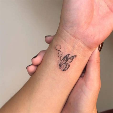 Tattoos For Girls On Wrist In 2025 Butterfly Wrist Tattoo Small Tattoos For Girls On Wrist In 2025 Butterfly Wrist Tattoo Small
