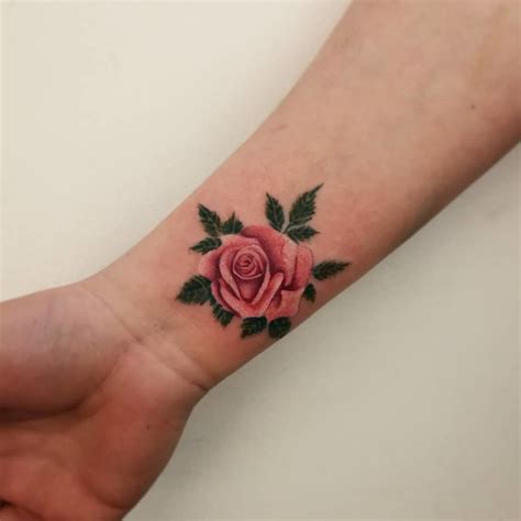 This Watercolor Inspired Pink Wrist Rose Tattoo Is Amazing See More This Watercolor Inspired Pink Wrist Rose Tattoo Is Amazing See More
