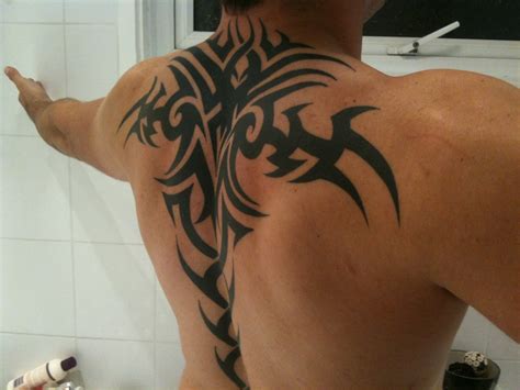 Top 10 Sexiest Tribal Back Tattoos For Men Mr Rauraur