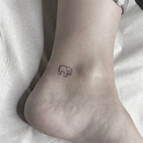 Top 10 Tiny Elephant Tattoo Ideas And Inspiration Top 10 Tiny Elephant Tattoo Ideas And Inspiration