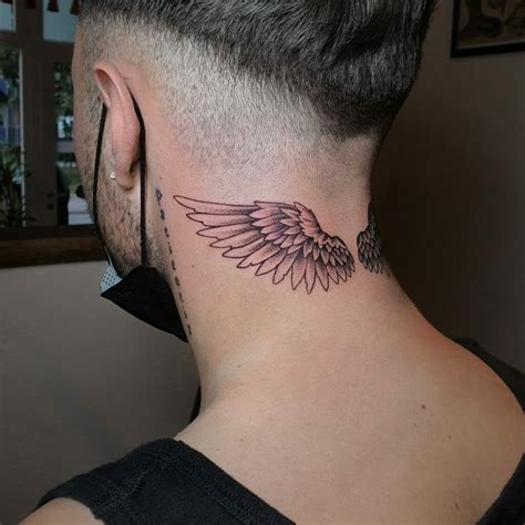 Wings Tattoo On The Neck